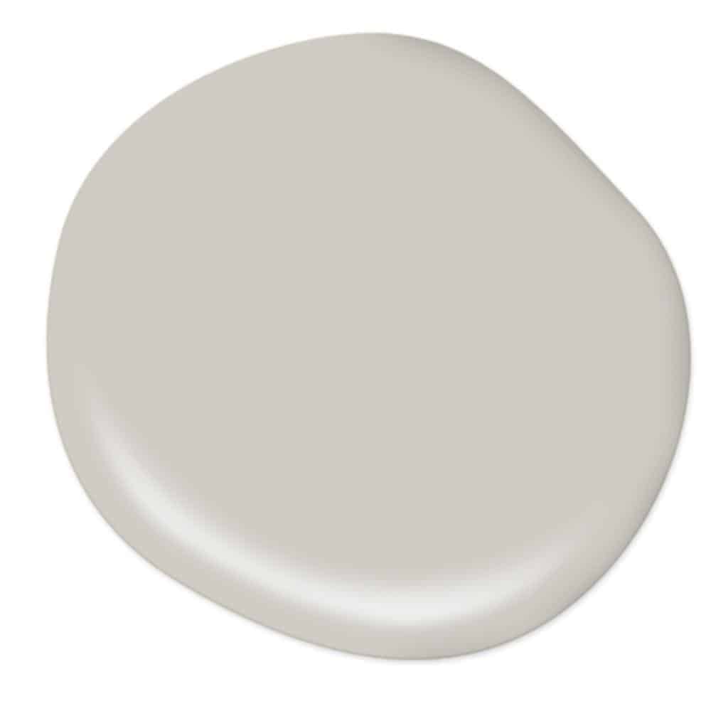 A paint-drop sample of Chic Gray - a light gray farmhouse style paint color