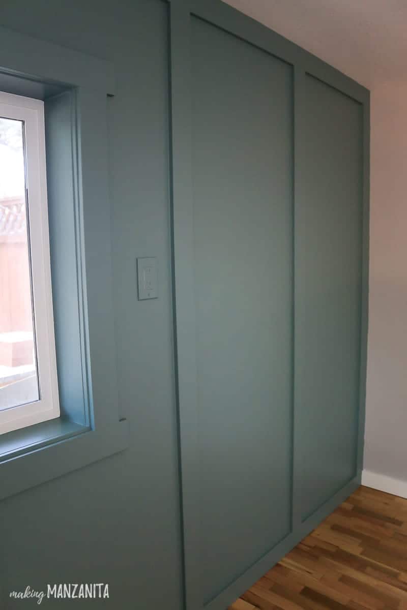 Floor to ceiling board and batten accent wall with vertical lines