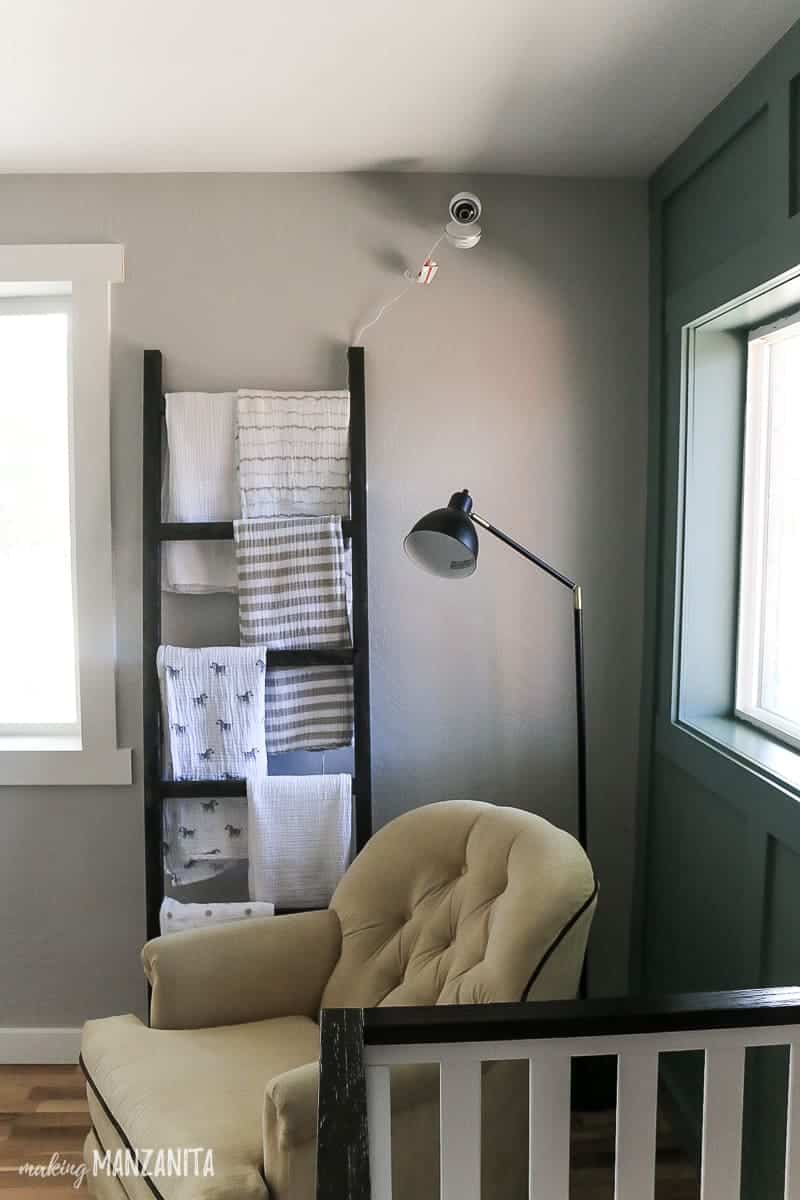This corner of our baby nursery is a sitting area, but also were we hung the video baby monitor, which is necessary for any baby nursery set up.