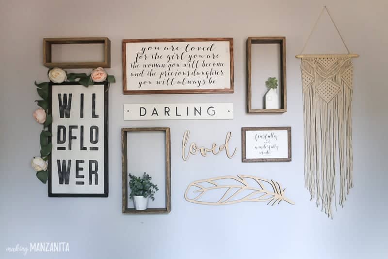 A boho style gallery wall was expertly planned out with this gallery wall planning technique