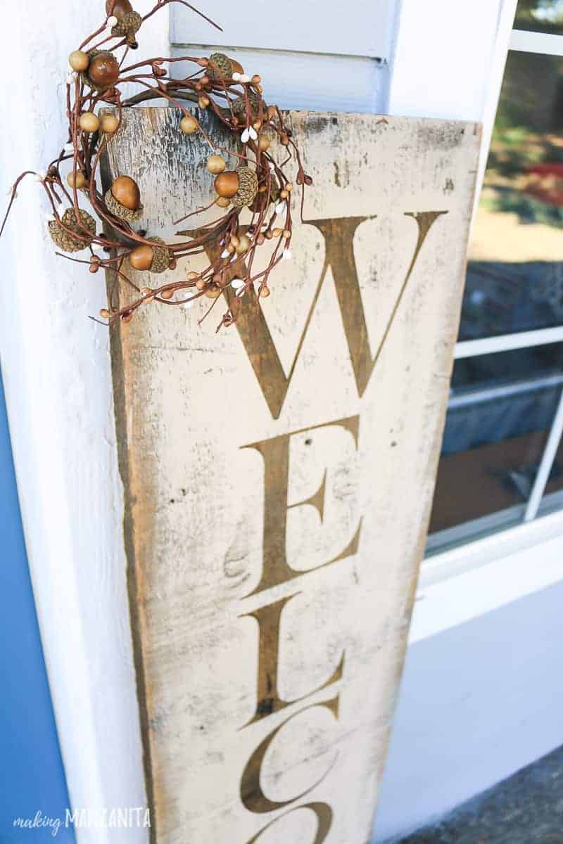 Rustic fall Welcome sign with autumn mini wreath in corner