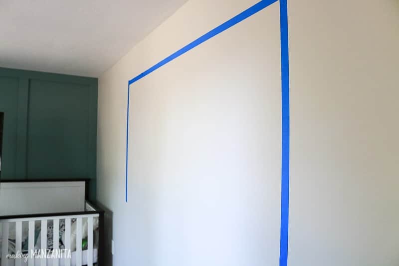 Tape boundaries of gallery wall before hanging wall decor