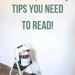 Paint buckets sitting on ladder with text overlay that says interior painting tips you need to read