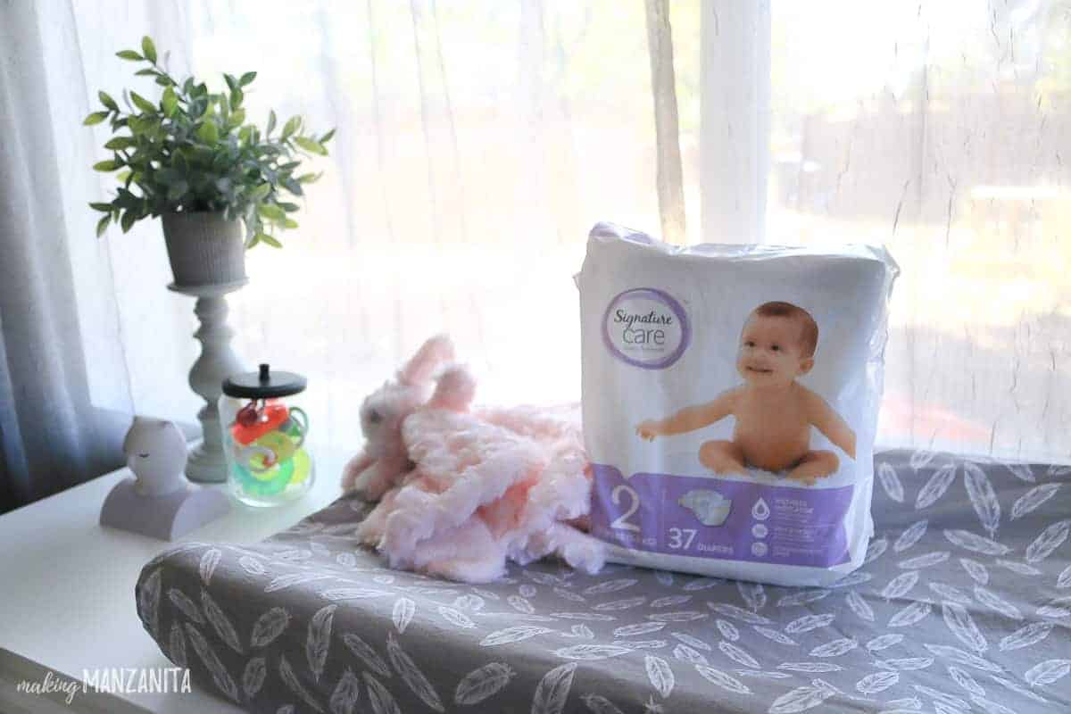 We keep our baby's changing table stocked with Signature Care Diapers