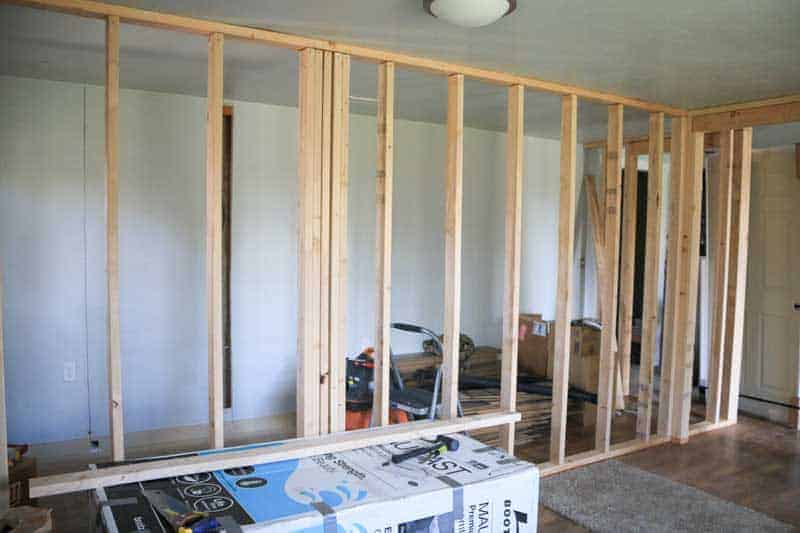 Putting up wood wall frames in the room that will be our new baby girl's farmhouse style nursery.