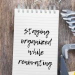Staying organized while renovating written on a notepad on wooden table with tools laying around with text overlay at the top that says download free project planning worksheet