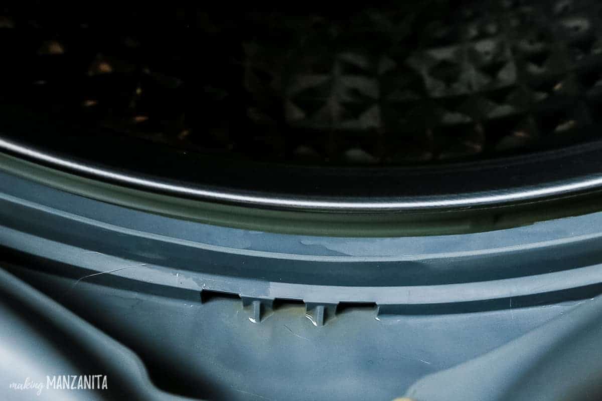 The clean interior rim of the front load washer, after scrubbing it down with baking soda and water.