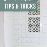 White subway tile wall in shower with shower niche and text overlay that says shower tile tips & tricks