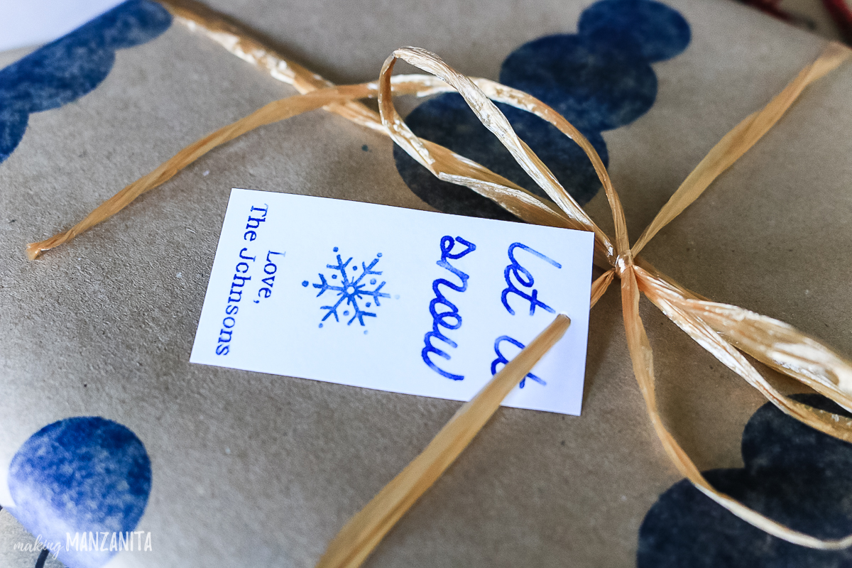 An adorable "let it snow" Christmas gift tag, made using the Silhouette Mint custom stamp maker.