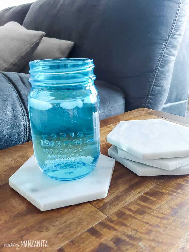 A homemade set of marble coasters are the perfect accessory for a side table next to the couch