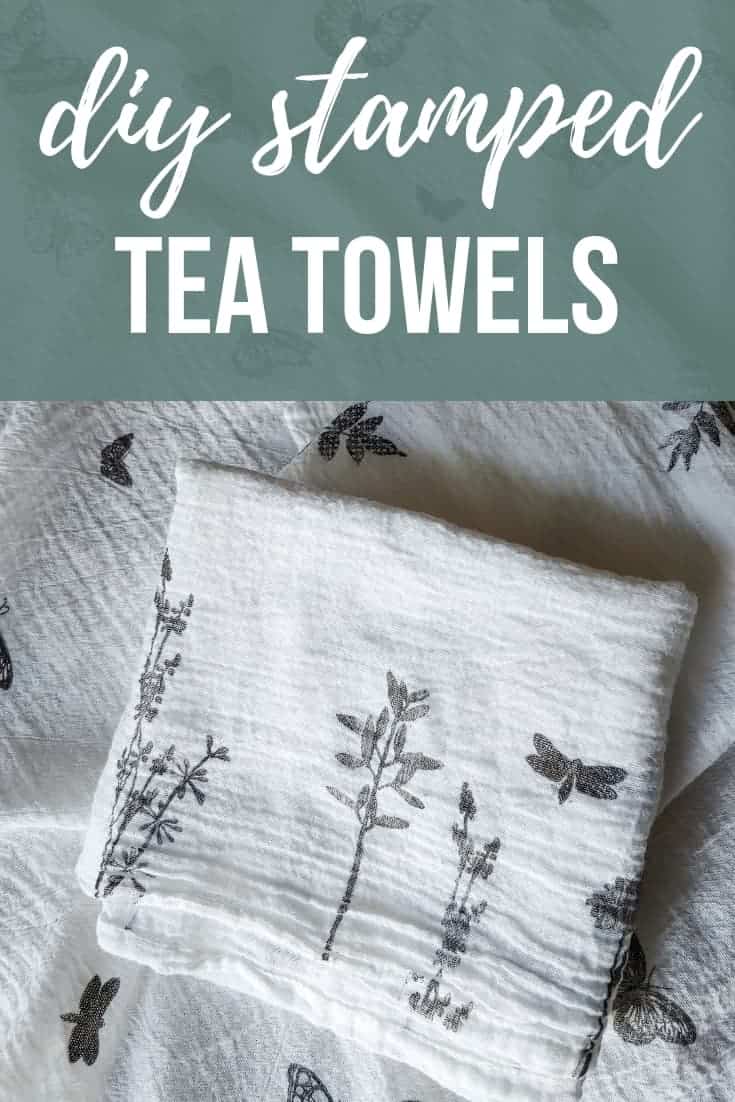 Custom white tea towels stacked together each have a unique design -- sprigs of leaves, butterflies, and flowers. Text across the top of the image reads "diy stamped tea towels"