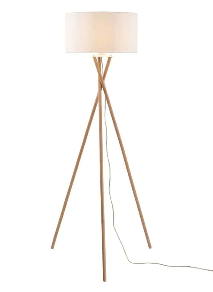 Modern looking floor lamp with wooden tripod stand and cylindrical drum shade