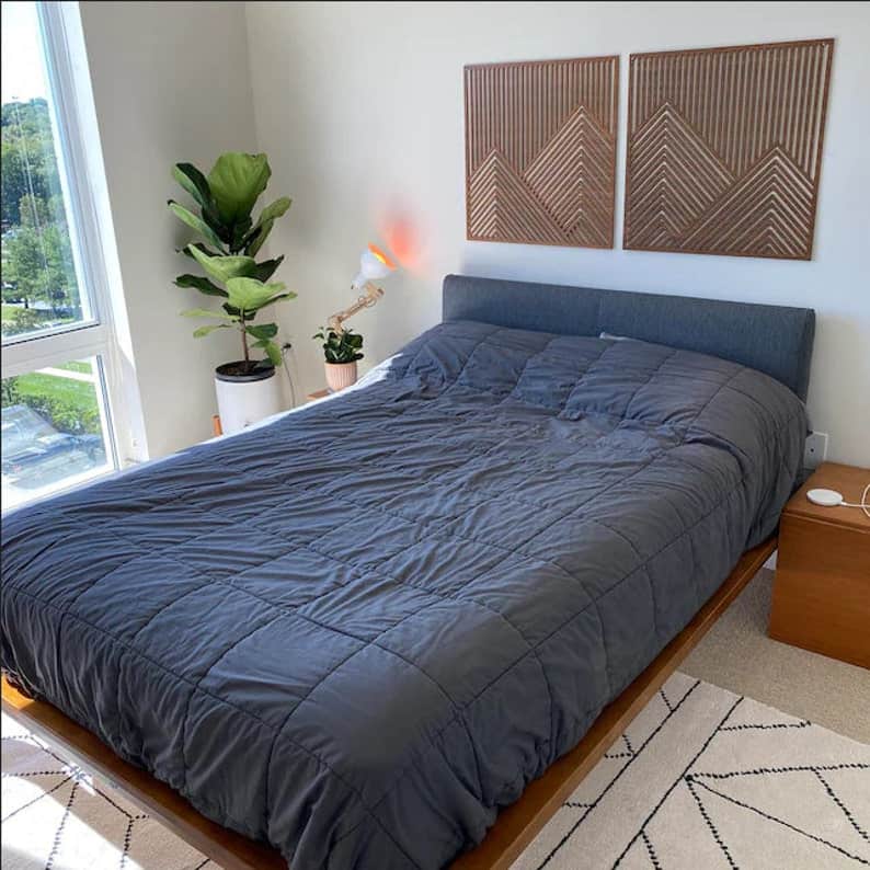 Looking for over bed ideas? This geometric mountain wooden wall art is the perfect solution! 