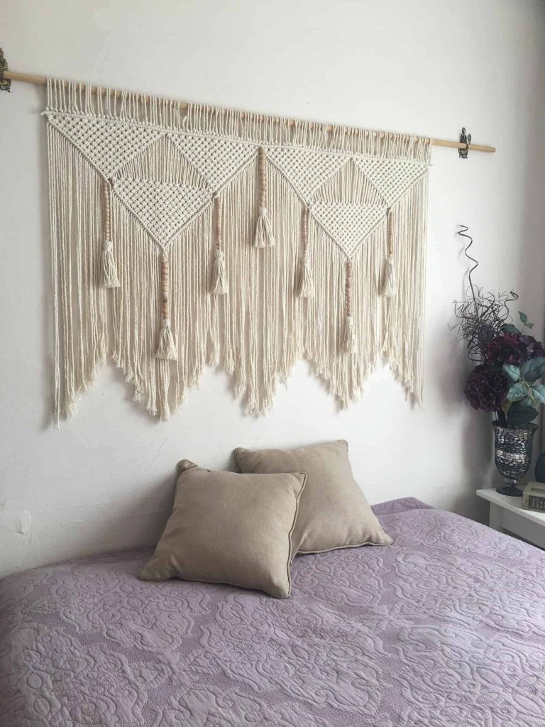 This macrame headboard hanging is a gorgeous ideas for a large wall hanging that can go above your bed if you don't have a headboard