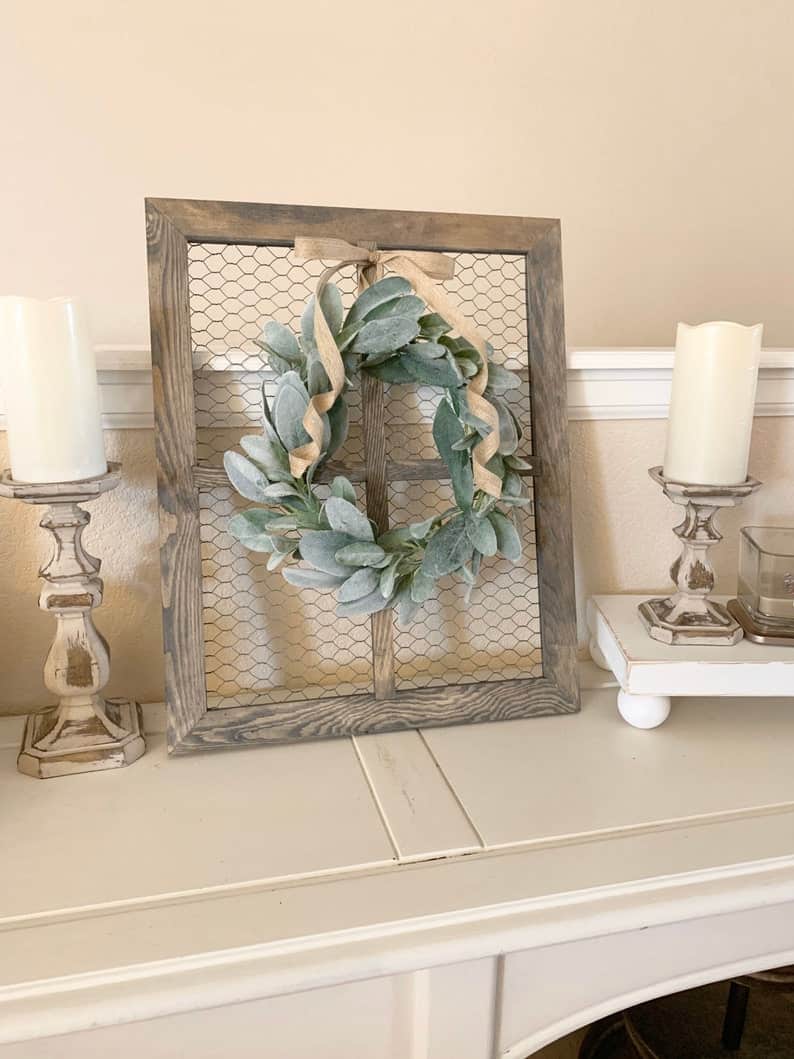 If you want to put a wreath above your bed, this lambs ear wreath on a wooden window frame with chicken wire is perfect to get that Fixer Upper farmhouse style.