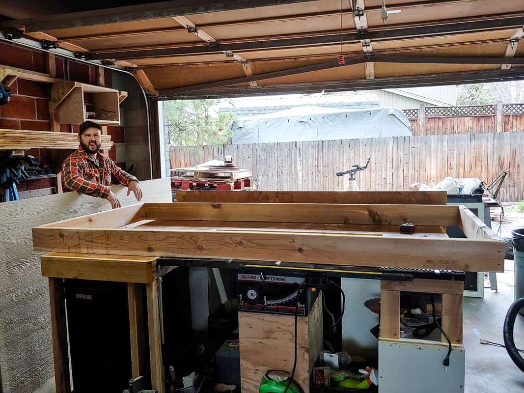 We started this outdoor chalkboard project by creating a large wooden box to house the chalkboard. We built this frame in our garage workshop.