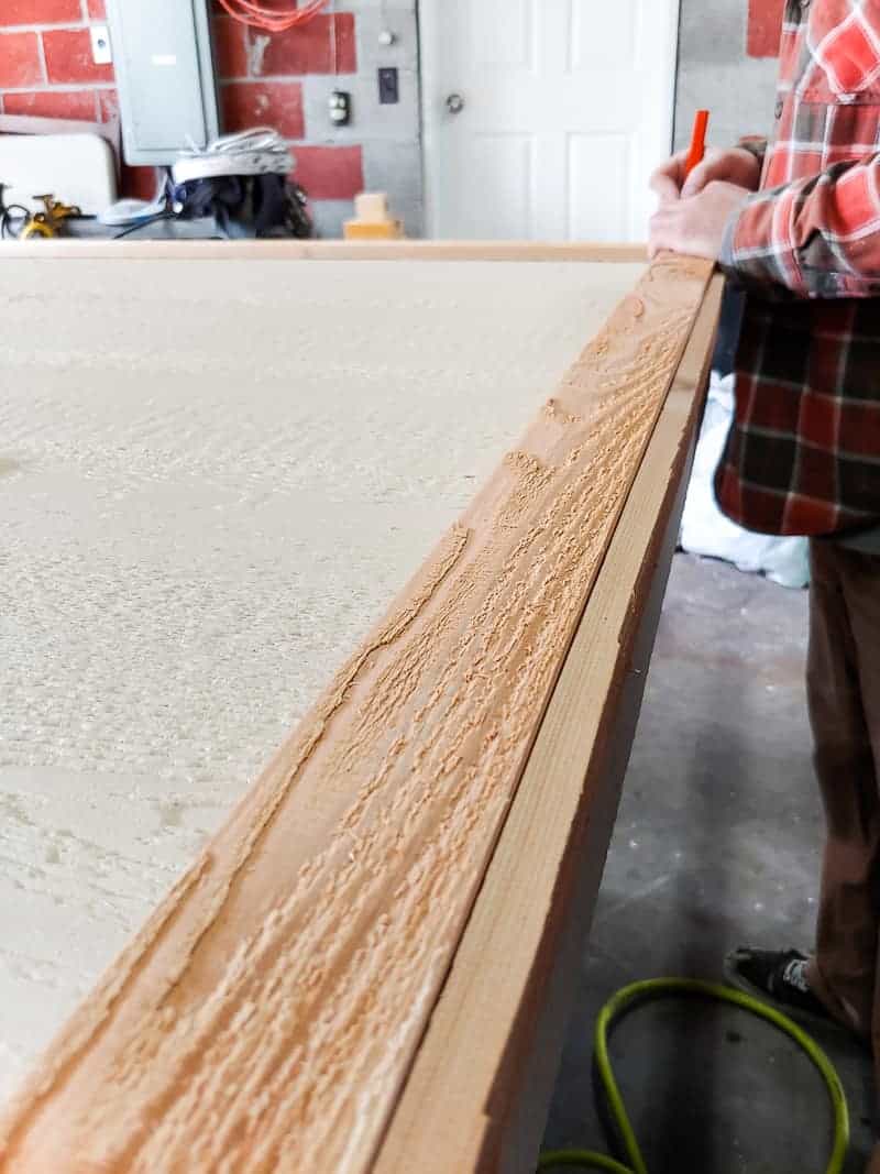 Ripping the cedar for trim and attaching to the kids chalkboard box.