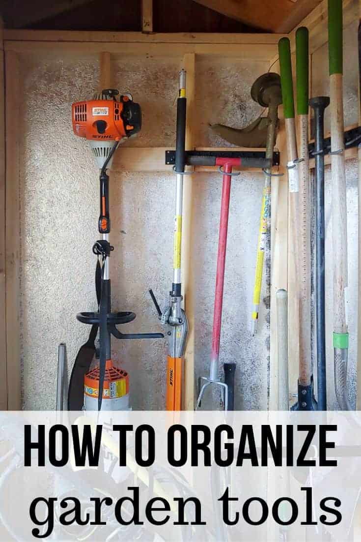 Image of garden tools hanging neatly in a wall mounted garden tool storage system with text overlay that says How to Organize Garden Tools