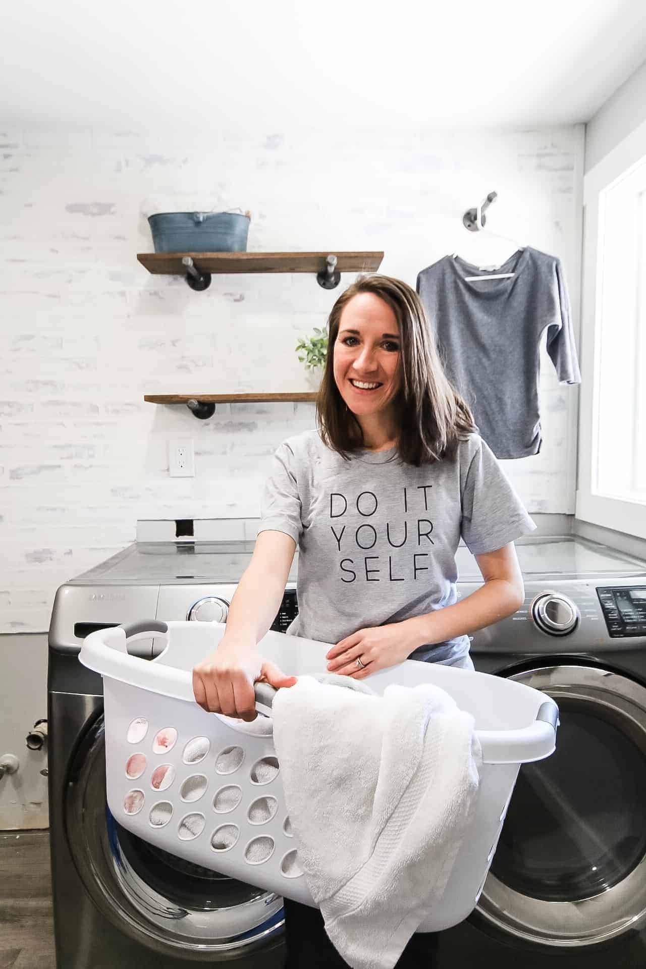 I love our farmhouse style laundry room, especially our industrial style pipe shelves that are perfect for extra storage