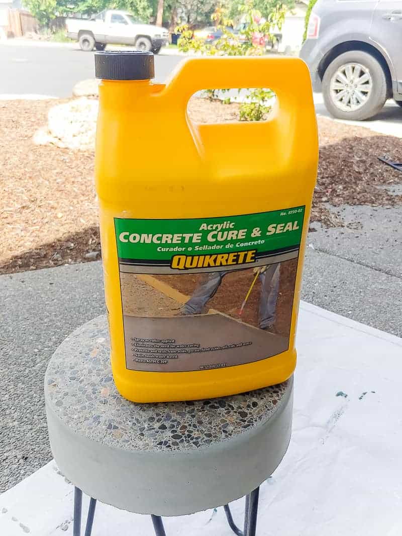 We used Quikrete concrete cure and seal solution to finish the top of our concrete patio side table