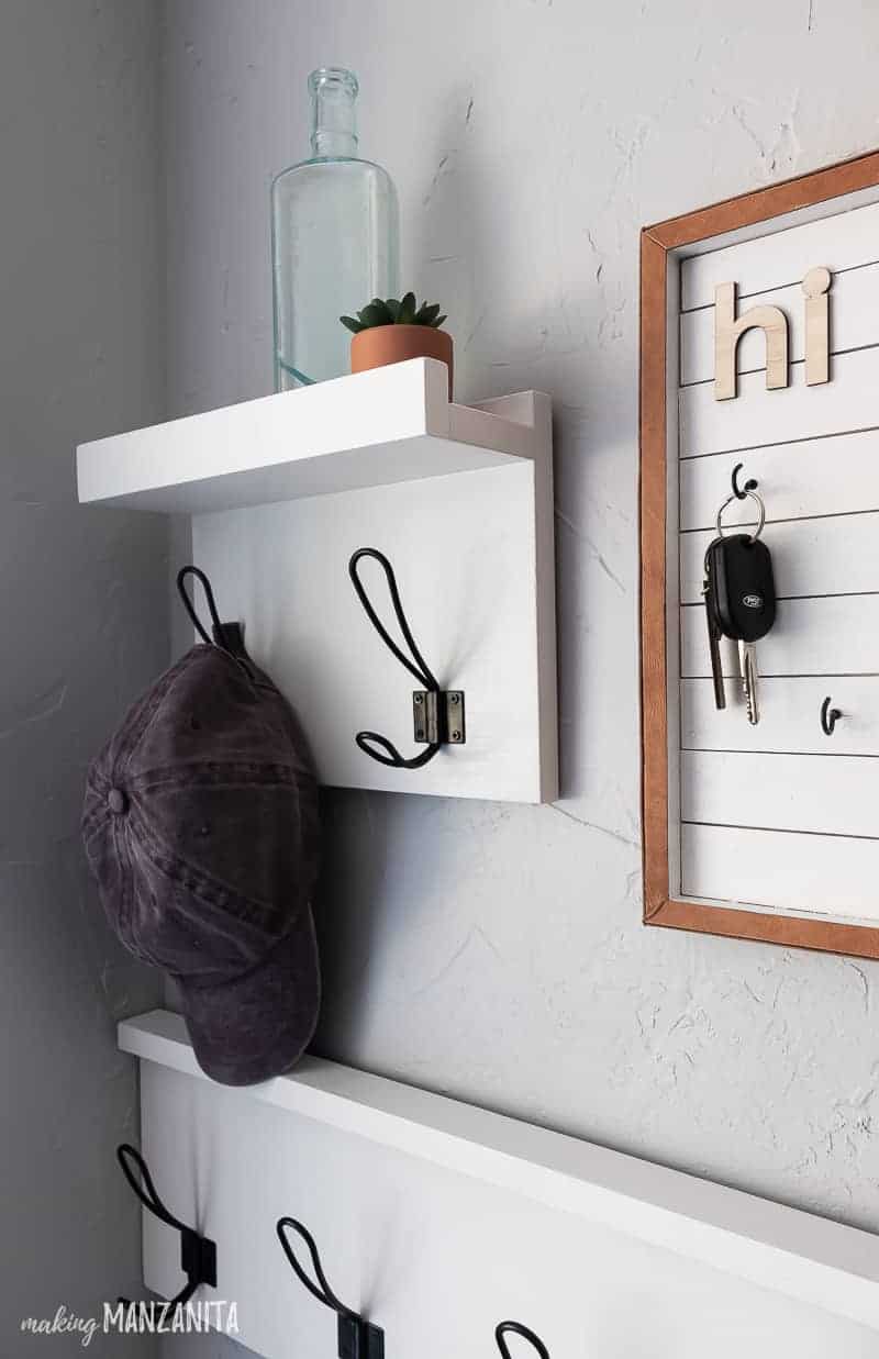 Closer look at the at hanging shelf with hooks and half of the DIY key holder