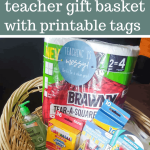 Teacher gift basket filled with paper towel pack, hand sanitizer, crayons, clips and pen with text overlay that says Back to School Teacher Gift Basket with Printable Tags