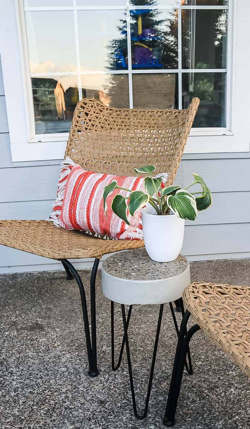 This easy DIY concrete side table is the perfect addition to your front or back porch!