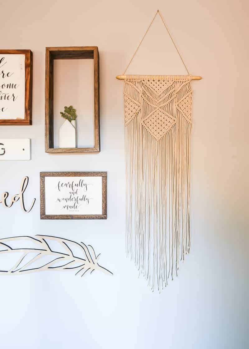This macramé wall hanging on our baby girl nursery gallery wall really adds to the boho theme.