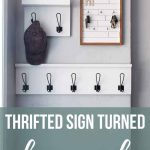 Entryway look with key holder and hanging shelves with text overlay that says Thrifted Sign Turned Key Rack