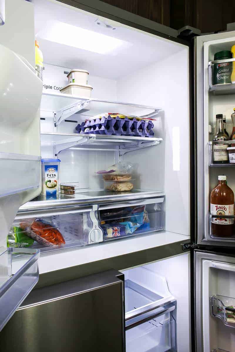 Foods added back in place after the refrigerator clean out.