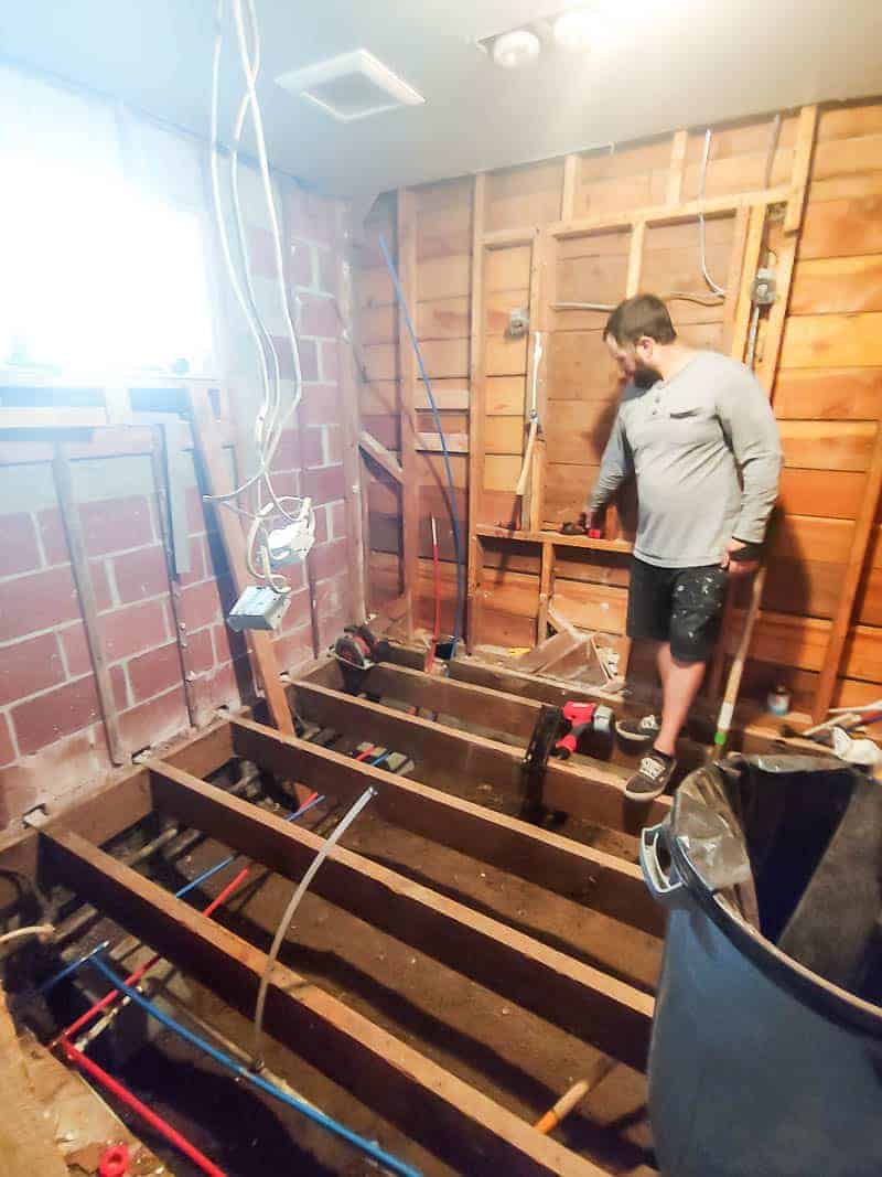 During our master bathroom demo and remodel, we removed the subflooring down to the dirt in order to put in more plumbing.
