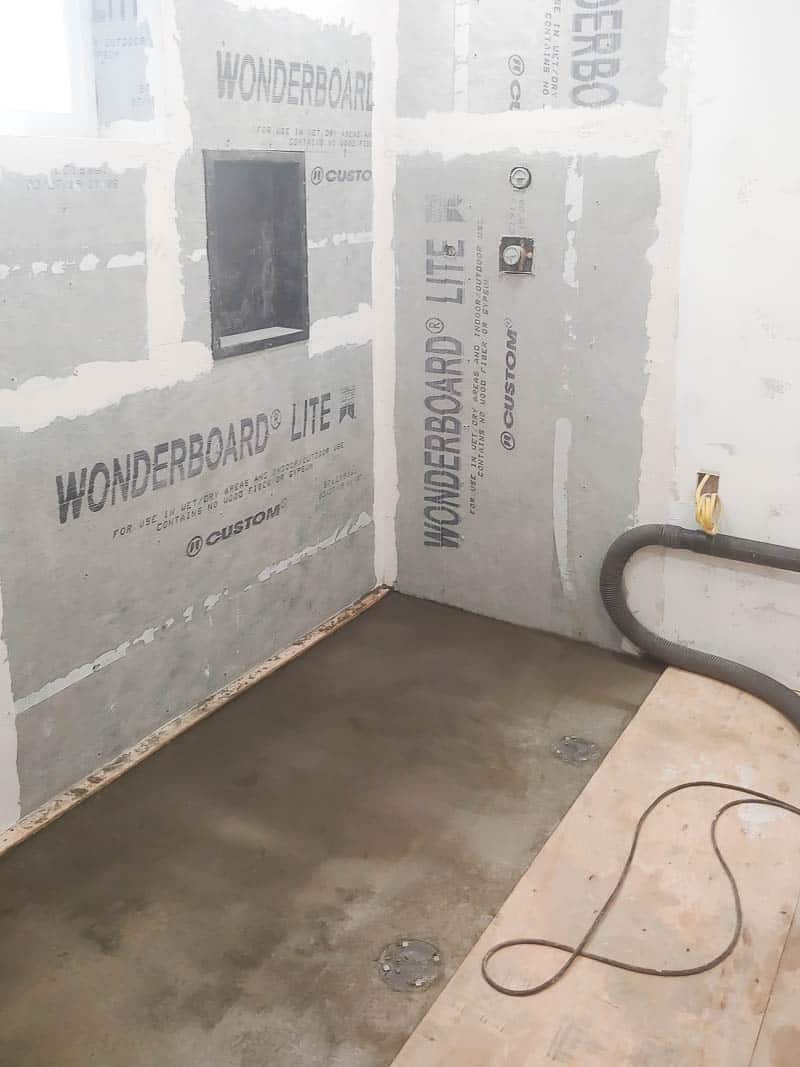 The final shower pan cementing in our master bathroom renovation