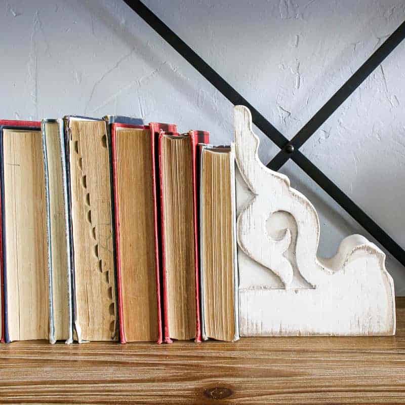 Vintage books with the spines turned inwards make great Living Room Shelf Decor for any season.