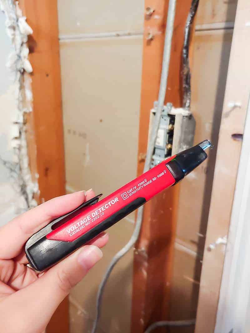 When demoing a bathroom, a voltage detector is an important tool to have when working around electrical wires.