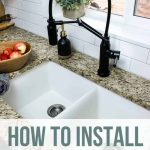 Closer view of the kitchen sink and black faucet with text overlay that says How to Install Undermount Sink without Making Countertops