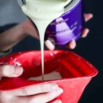 Pouring paint into cup