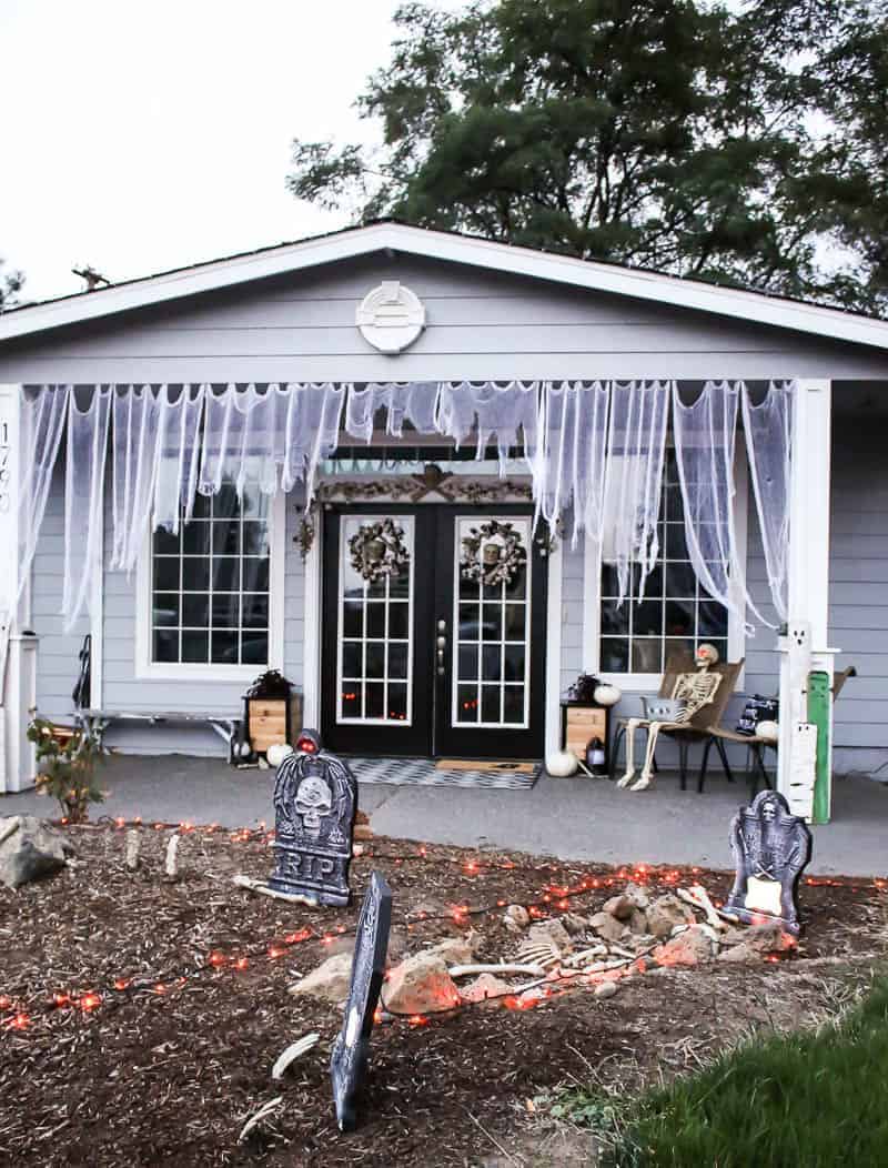 Curtains, Skeleton, fake gravestone, skull wreath for the Halloween Porch Decor 