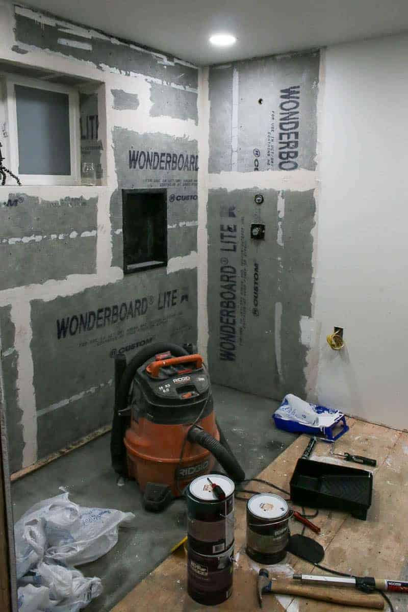 Concrete backer board up in shower before tiling is started during 6 week bathroom renovation for Jeffrey Court Renovation Challenge