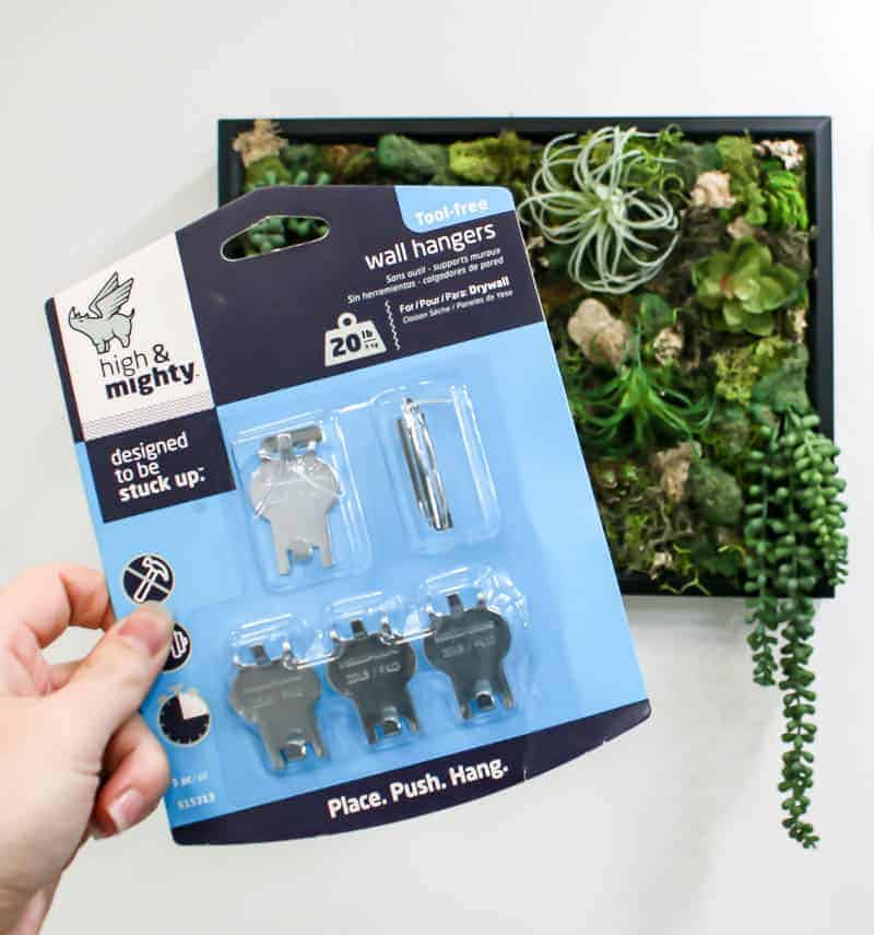 A package of High and Mighty wall hangers - the perfect tool to expertly hang your DIY fake succulent wall decor