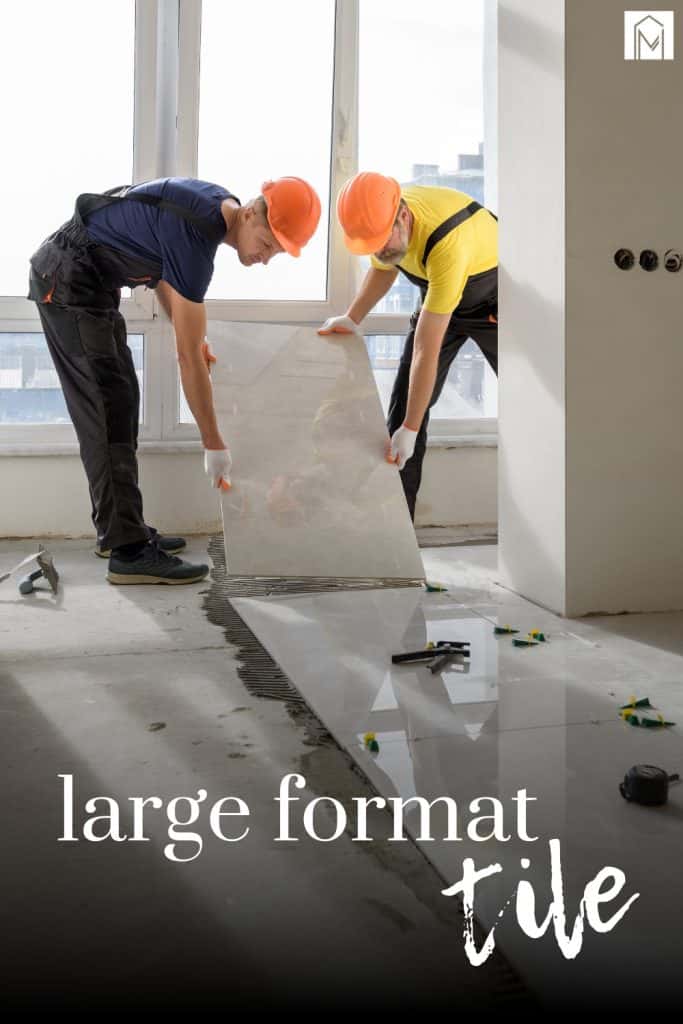 Two men holding large format tile during installation with text overlay that says large format tile