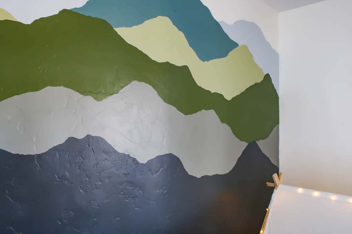 After picture of the painted wall mural with mountains