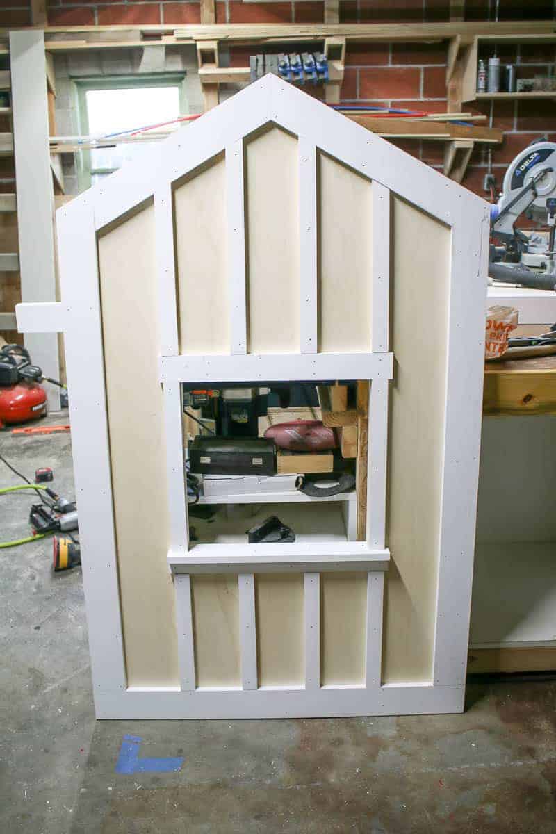 The footboard of this DIY children's cabin bed. This big kids bed is a fun DIY for a rustic and outdoors theme kids room