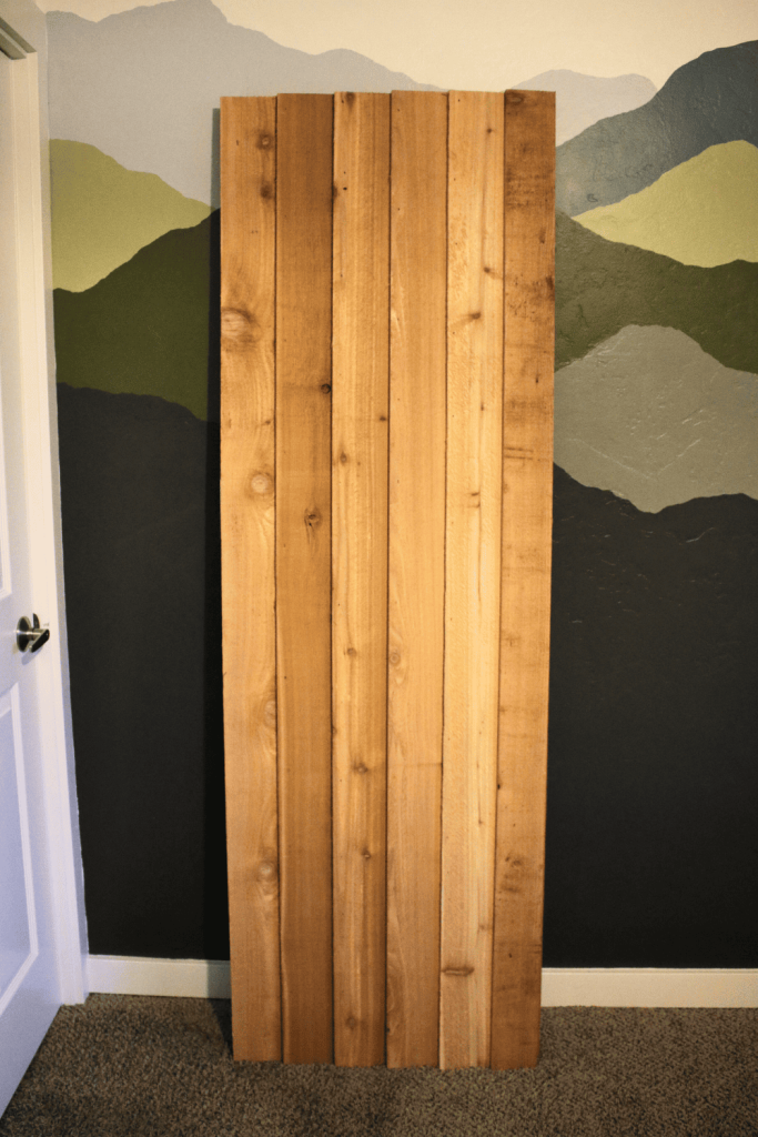 Roof panel made out of cedar fence pickets for kid's cabin bed