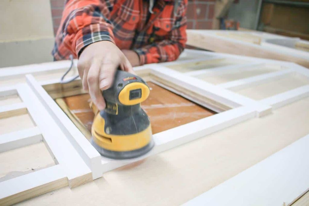 Fill all nails holes with wood filler and sand smooth with an orbital sander 