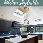 Dark blue modern kitchen with dark cabinets and dark appliances with a wood kicthen island with white counter tops, brighten with a skylight. Text overlay says " 7 reasons to add kitchen skylights"