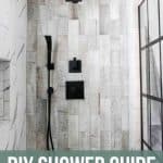 Beige rectangle tile with black shower head and panel windows. Texts says DIY Shower Guide (read this before you start)