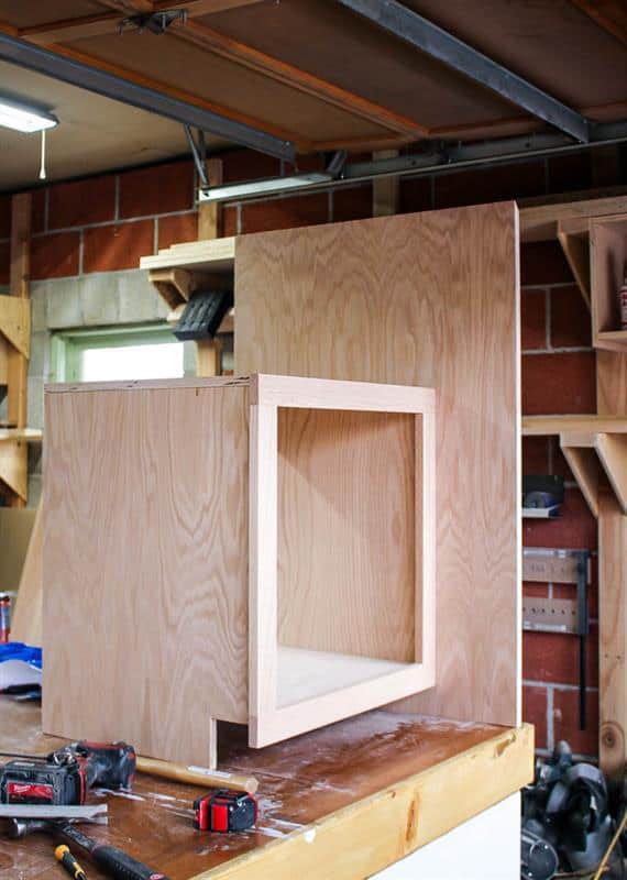 Photo of a sink cabinet being assembled.