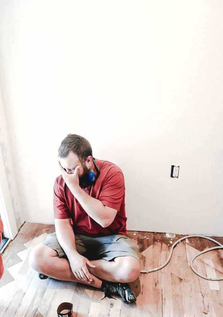 Renovating old homes is exhausting! Sometimes you just have to sit on the old hardwood floor in the middle of renovating and take a break