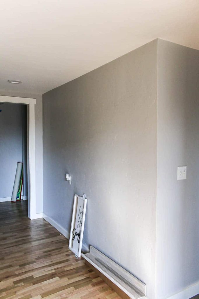 This blank wall is about to be packed with kids art hung on functional clipboards