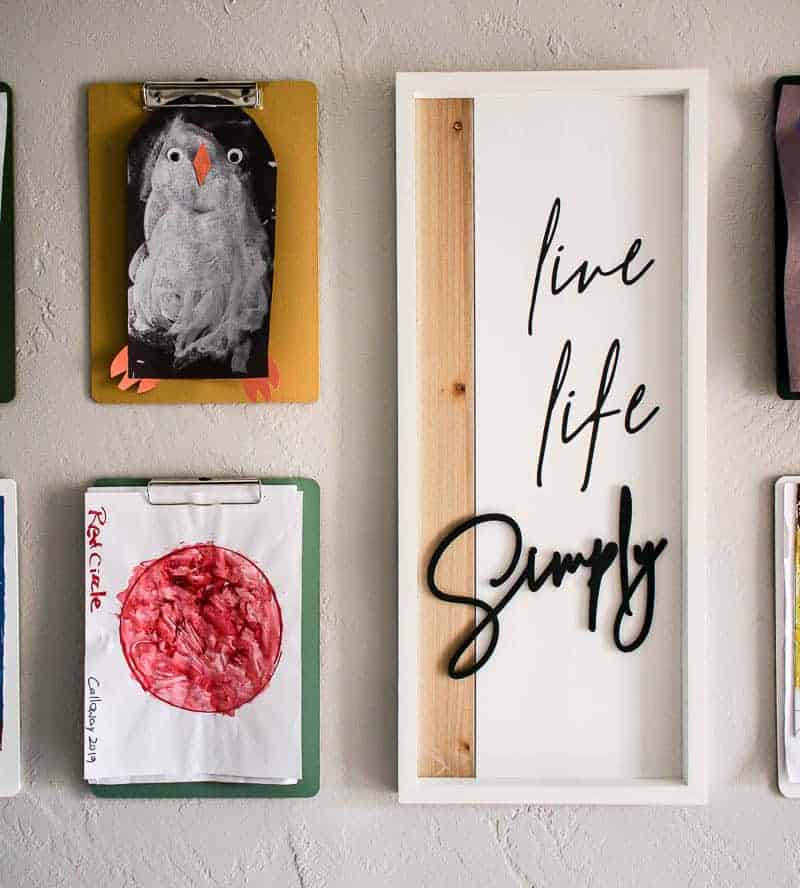 This clipboard gallery wall is the perfect way to display precious works of art from your children